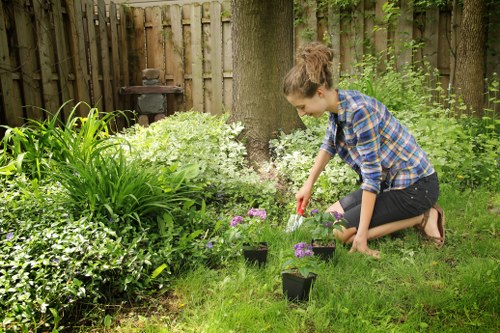 Professional landscaper working on a Southgate outdoor space